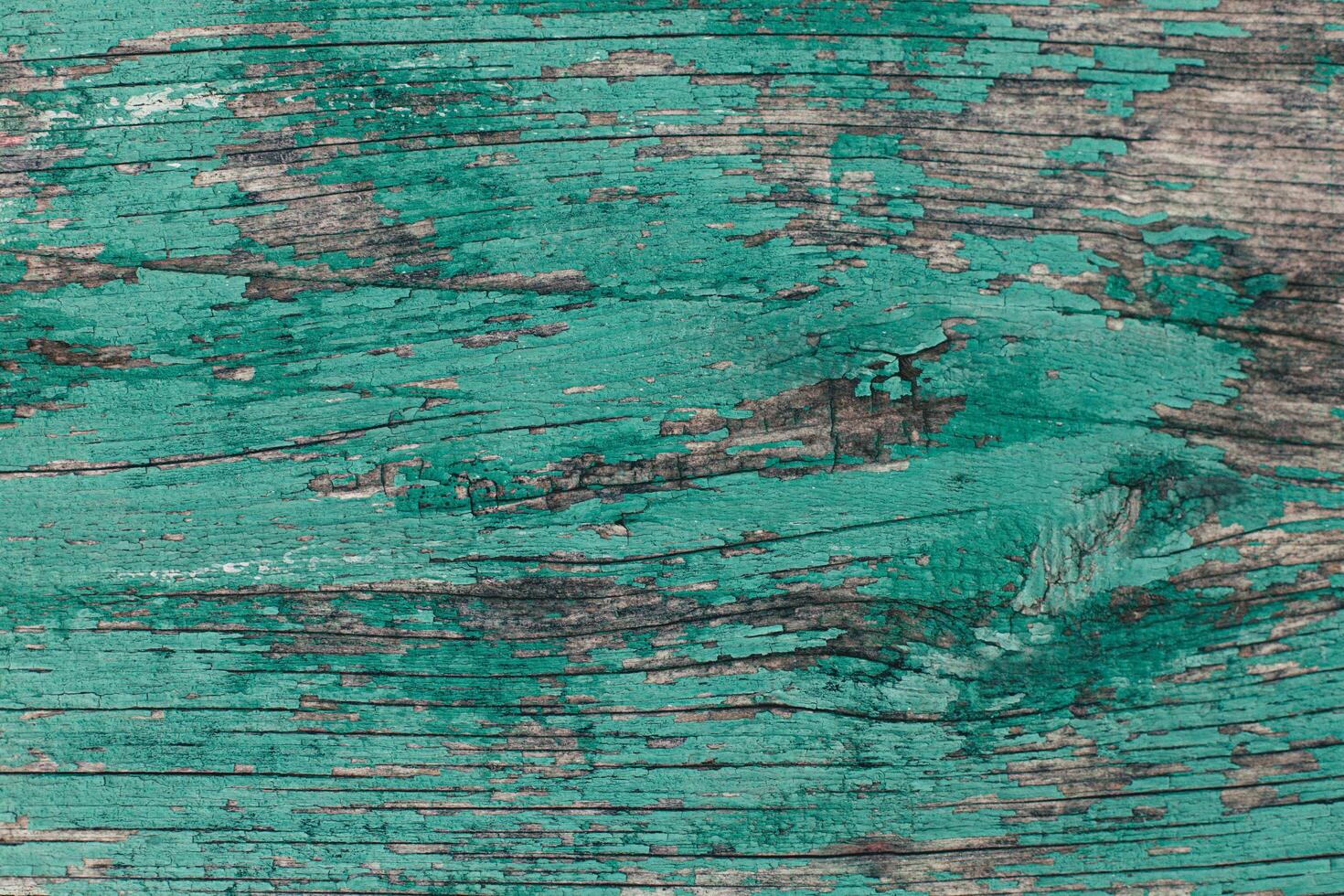 Rustic wood texture or background with turquoise paint. photo