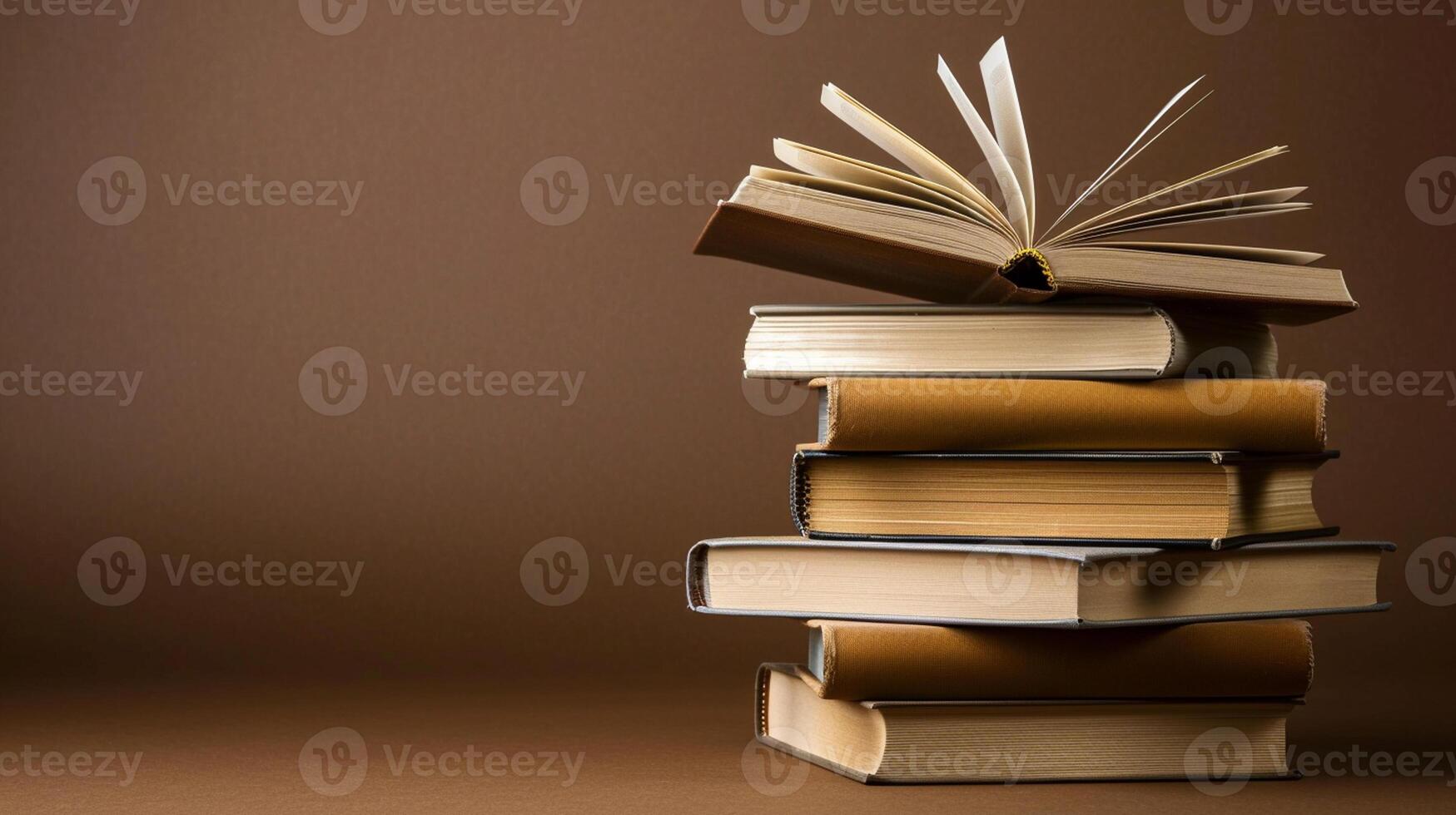 Stack of books on a brown background. Concept for World Book Day. photo