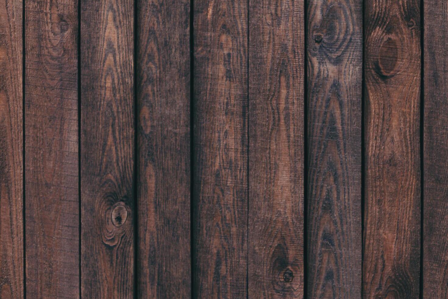 Dark brown wood texture or background. photo