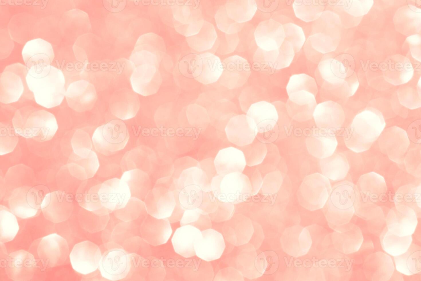 Abstract background in coral color. Shiny glitter bokeh. photo