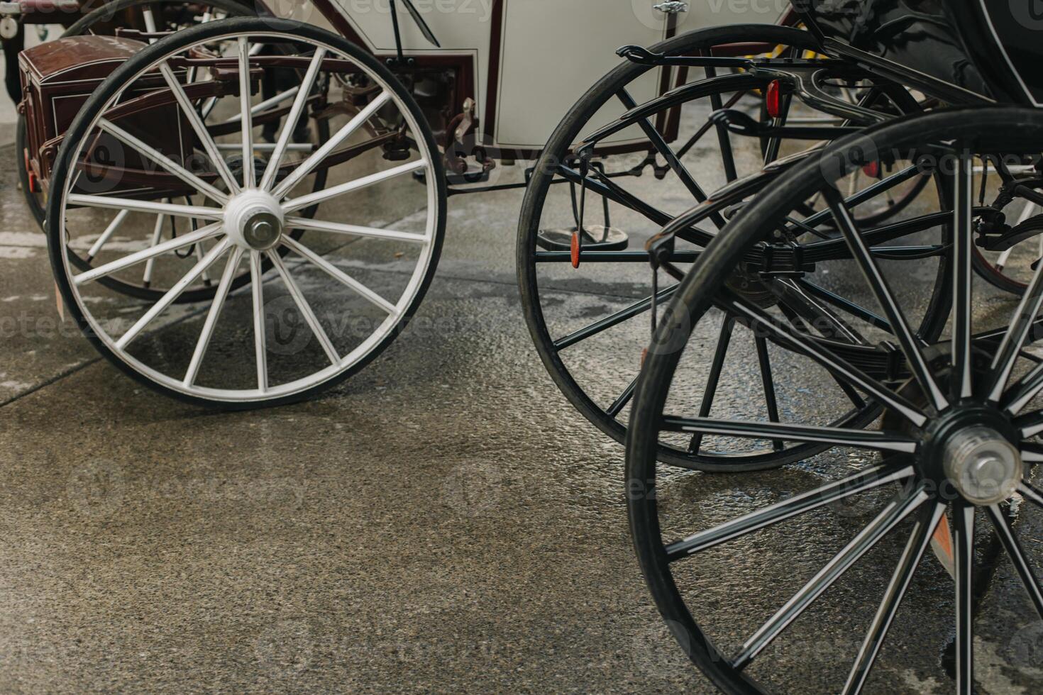 Carriage wheels on the street of Vienna, Austria. photo