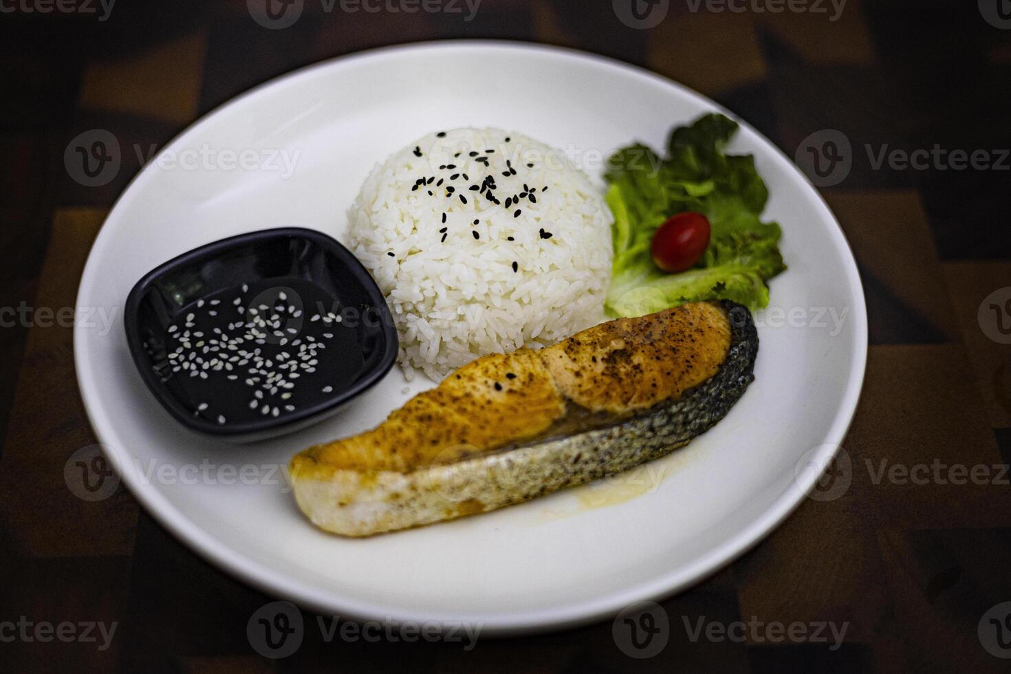 Grilled Salmon On Rice With Teriyaki Sauce photo