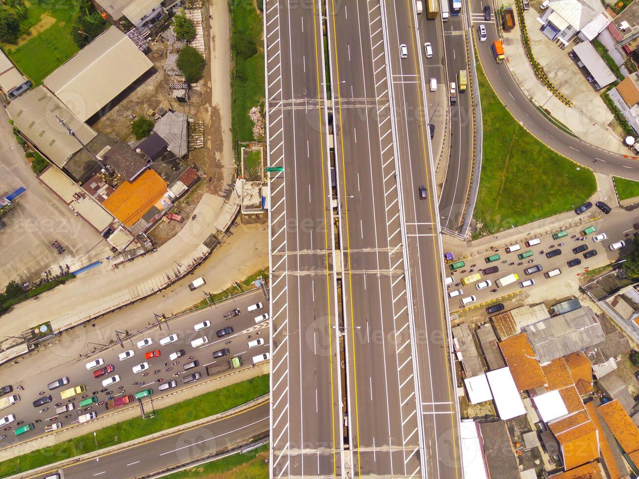 Bird eye view of Cileunyi Highway overpass, highway above the Cileunyi intersection, Bandung, West Java Indonesia, Asia. Transportation Industry. Above. Inter-city road access. Shot from a drone photo