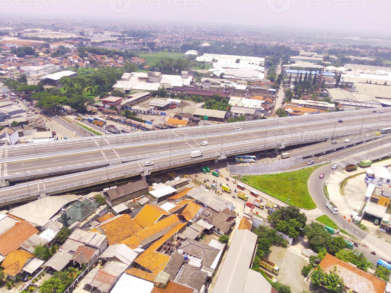 Bird eye view of Cileunyi Highway overpass, highway above the Cileunyi intersection, Bandung, West Java Indonesia, Asia. Transportation Industry. Above. Inter-city road access. Shot from a drone photo