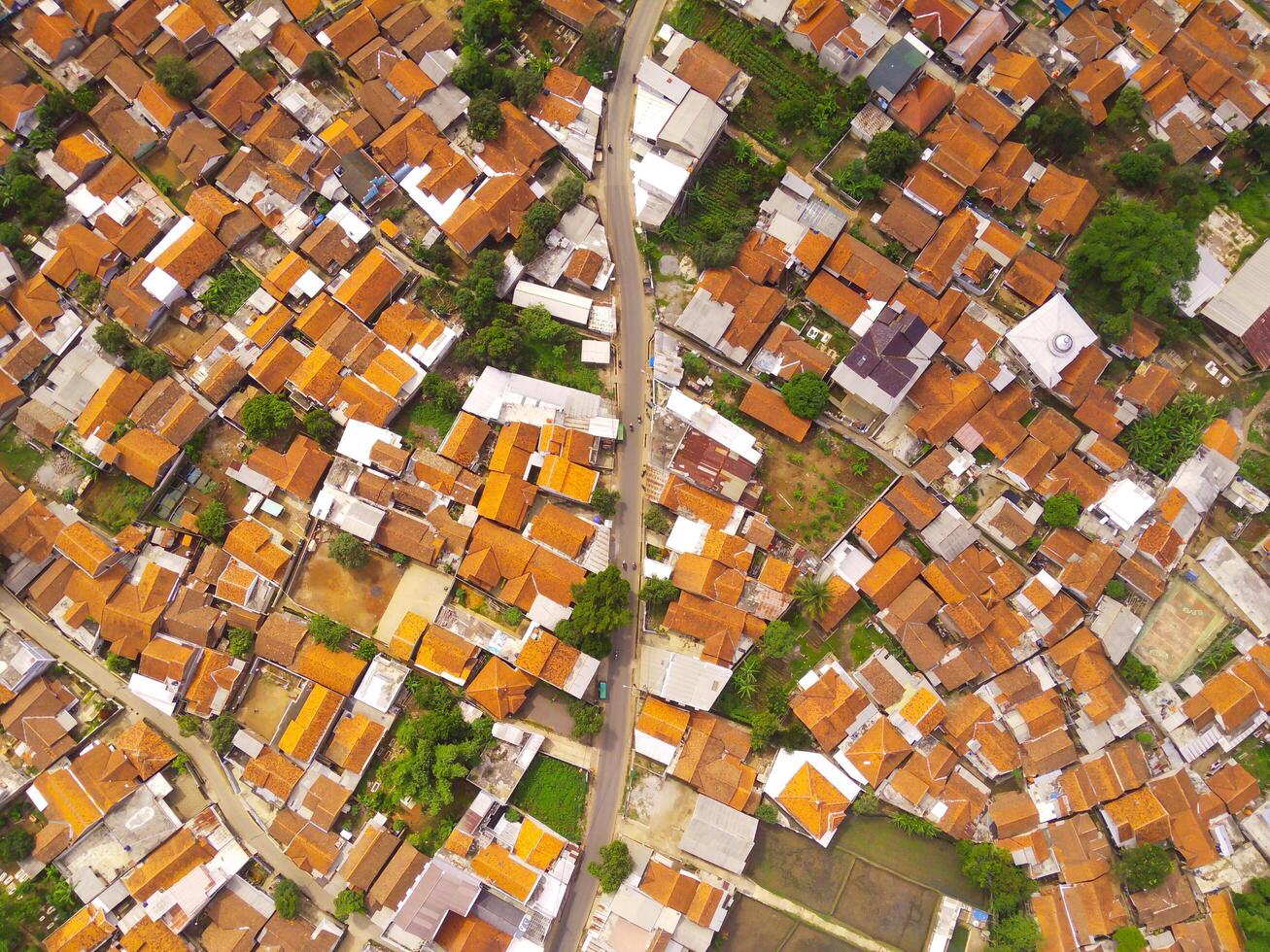 Aerial view of Highly Populated Area in Bandung City, capital of West Java Province, Indonesia. One of the most densely populated residential districts in Asia.Shot from a drone flying 200 meters high photo