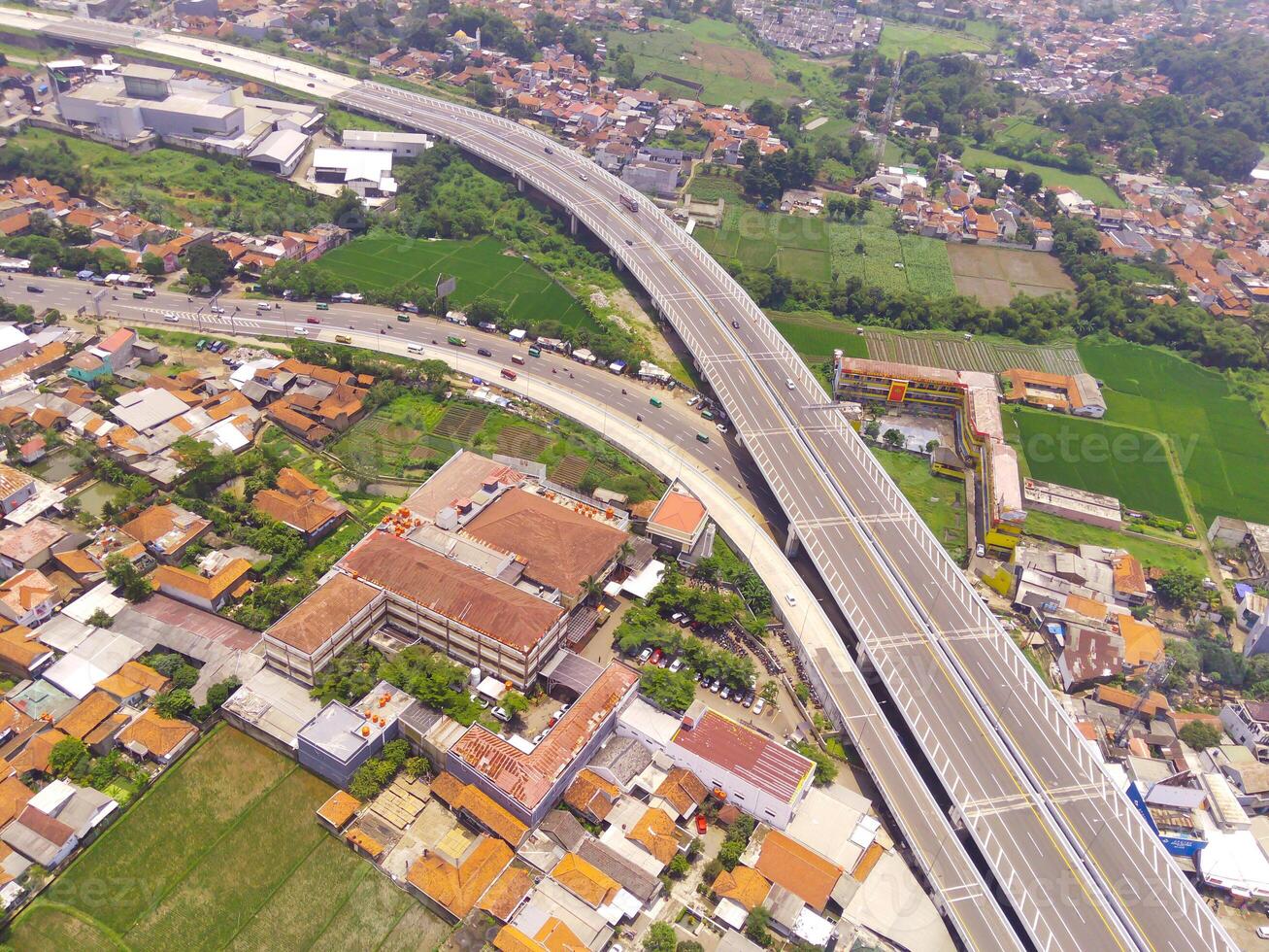 Bird eye view of Cileunyi Highway overpass, highway above the Cileunyi intersection, Bandung, West Java Indonesia, Asia. Transportation Industry. Above. Inter-city road access. Shot from a drone photo