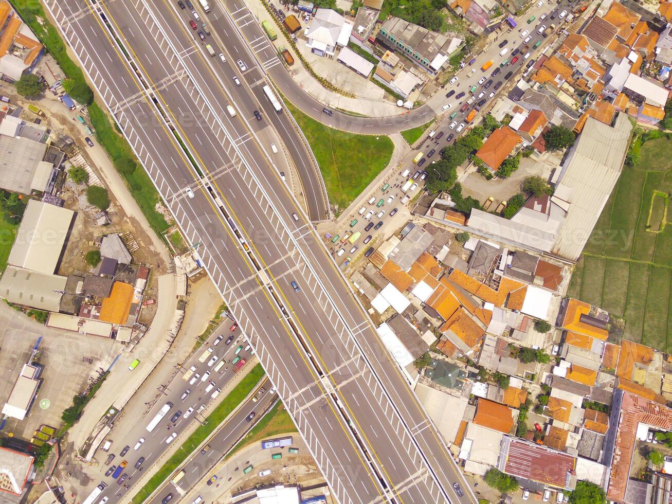 Bird eye view of Cileunyi Highway overpass, highway above the Cileunyi intersection, Bandung, West Java Indonesia, Asia. Transportation Industry. Above. Inter-city road access. Shot from a drone photo