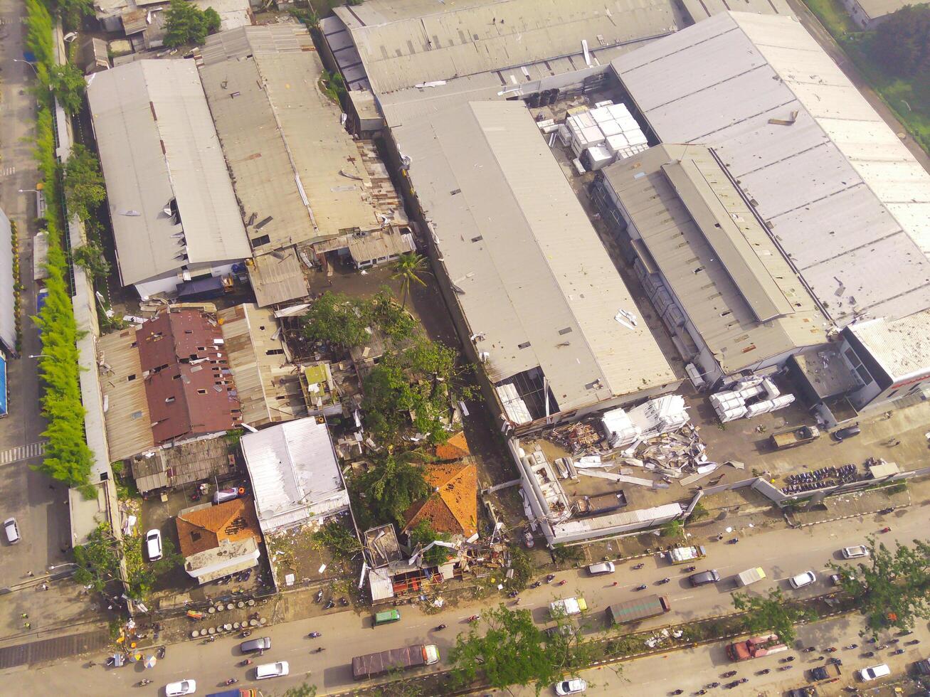 The impact of the natural disaster of a typhoon that hit the Rancakek area and the Sumedang border on February 21 2024, Indonesia. Shot from a drone flying 200 meters high photo