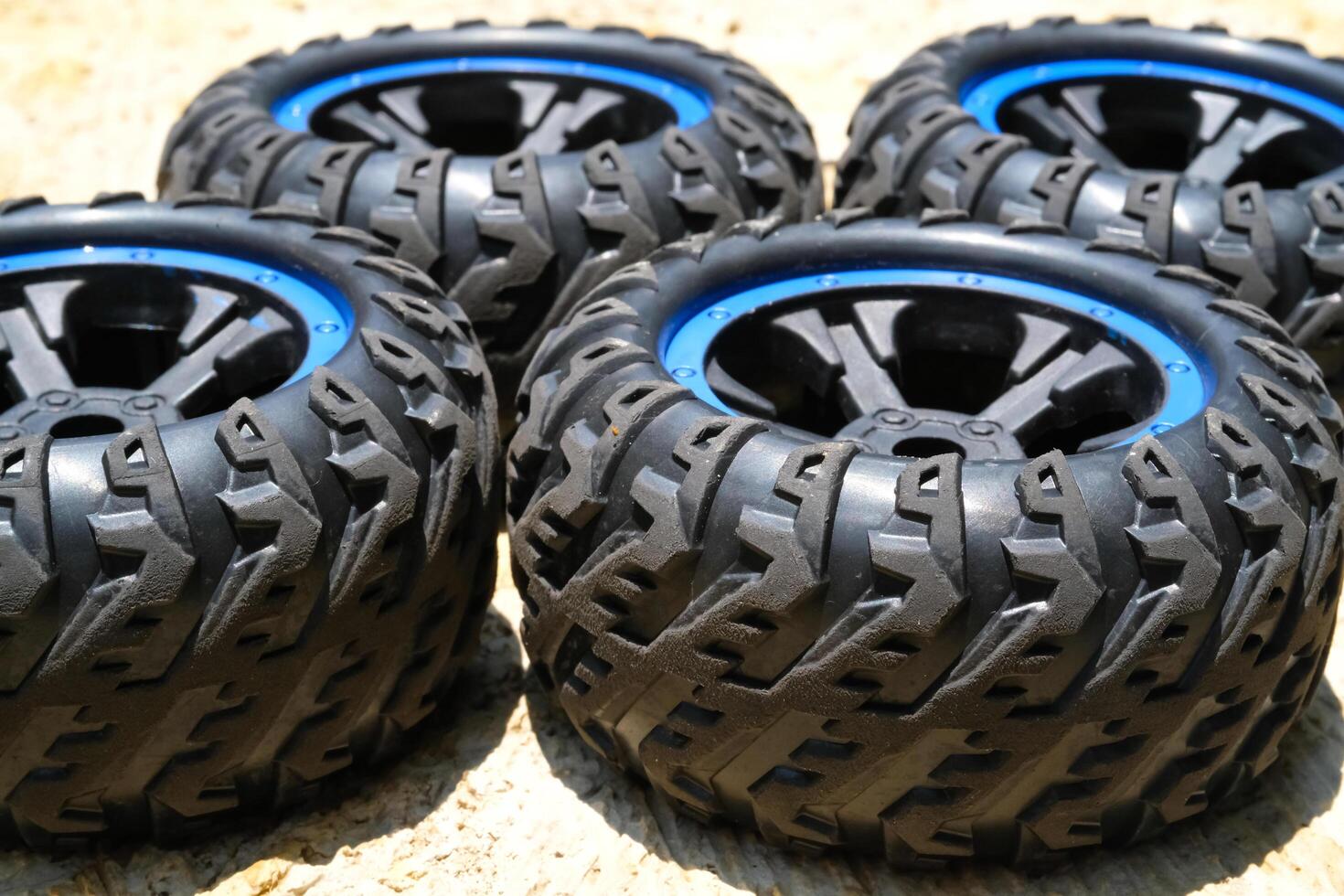 Two pairs of new Toy car rubber tires. Part of RC Remote Control Car. Toys Photography. Hobbies and leisure. Selective Focus. Textured Details. Shot in Macro lens photo