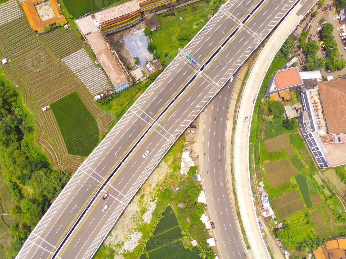 Bird eye view of Cileunyi Highway overpass, highway above the Cileunyi intersection, Bandung, West Java Indonesia, Asia. Transportation Industry. Above. Inter-city road access. Shot from a drone photo