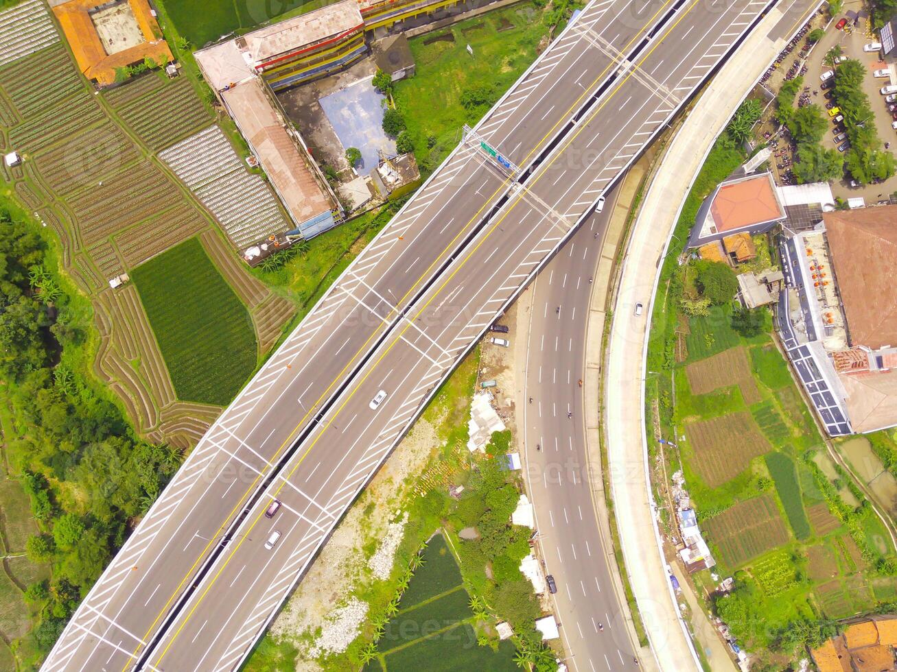 Bird eye view of Cileunyi Highway overpass, highway above the Cileunyi intersection, Bandung, West Java Indonesia, Asia. Transportation Industry. Above. Inter-city road access. Shot from a drone photo