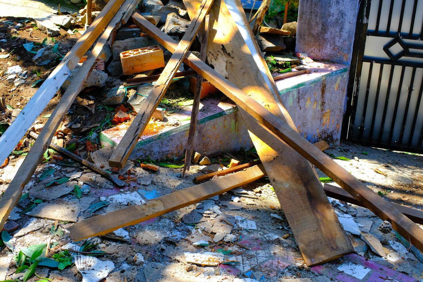 Industrial Photography. Construction Works. Photo of house debris after roof demolition. Roof removal for metal deck installation. Bandung, Indonesia