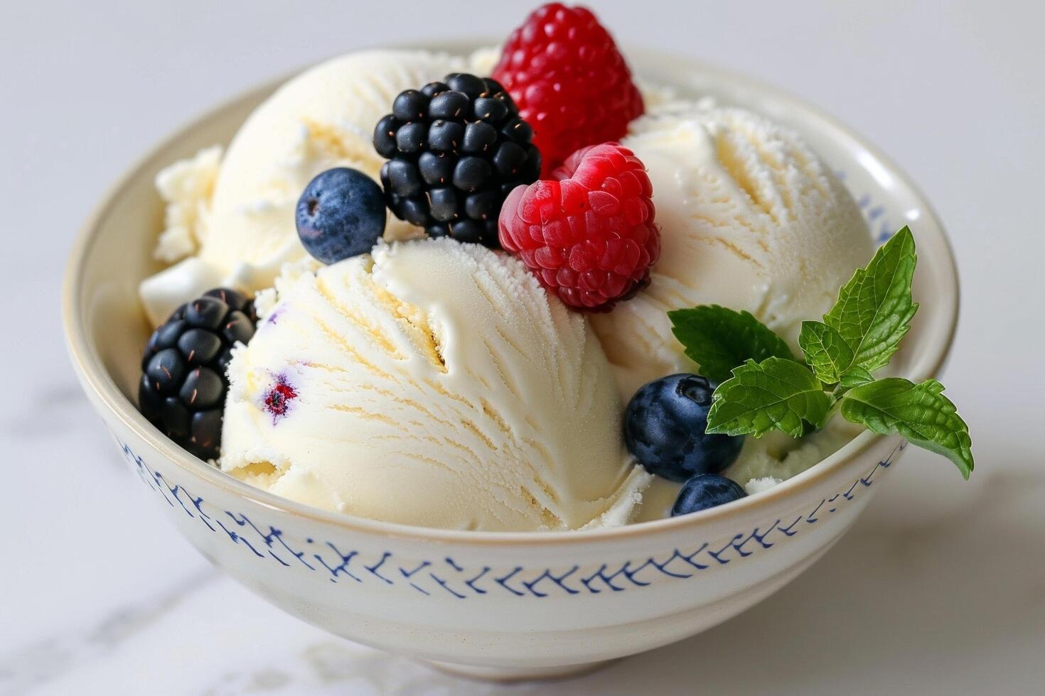 Vanilla ice cream with fresh berries on top. photo