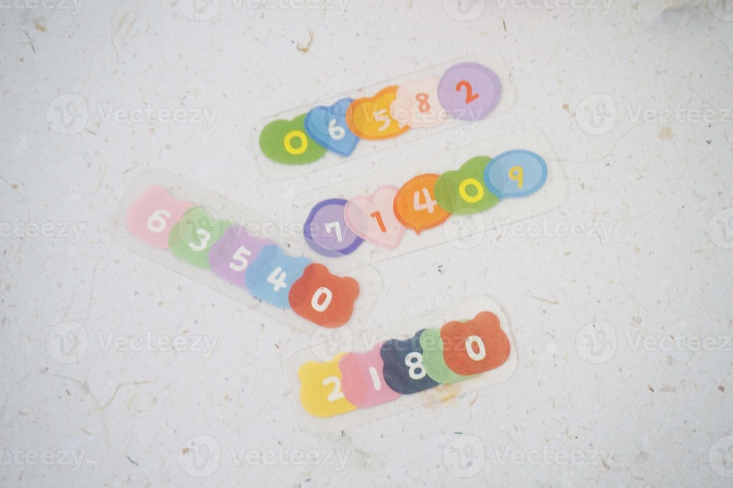 numbers printed on colorful stickers photo