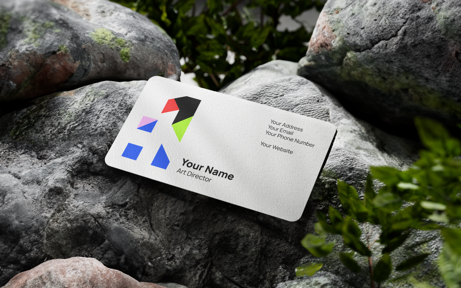 Horizontal Rounded Business Card Mockup on a Rock psd