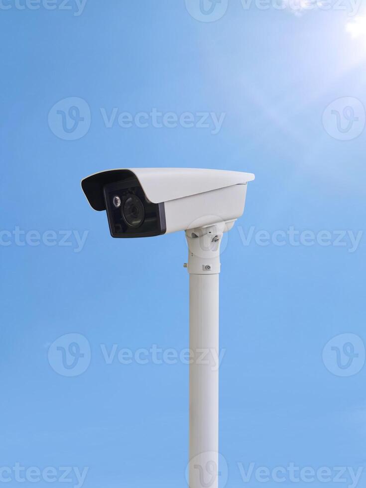 CCTV camera sky background photo