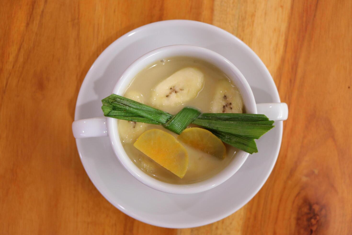 A bowl of banana compote seen above, is suitable for breaking the fast or advertising product photos during the month of Ramadan