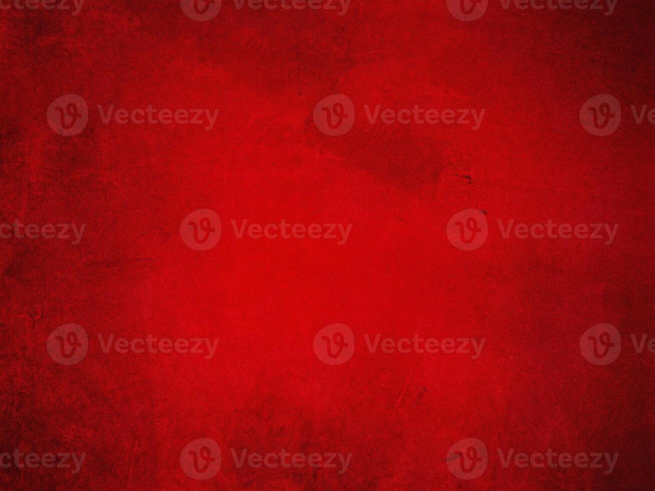 Red texture of suede leather with a vignette along the edge. photo