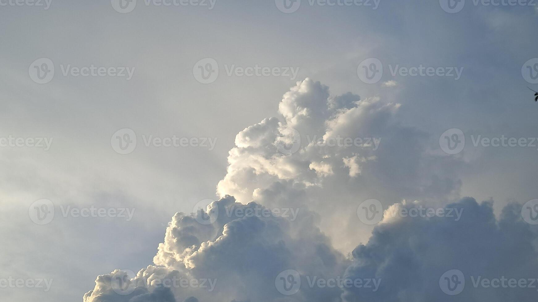 clouds covered the sun's rays photo