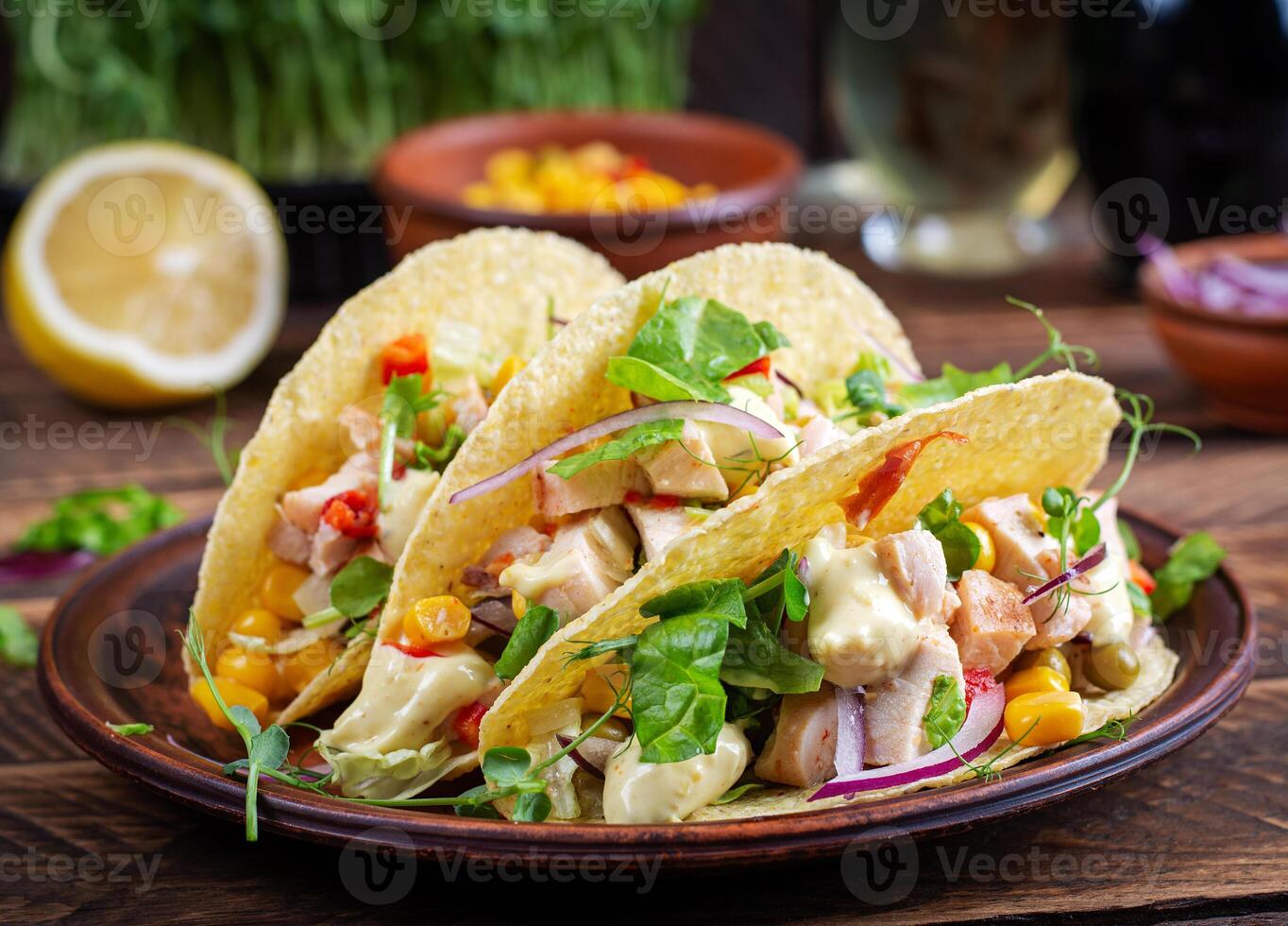 Mexican tacos with chicken meat, corn and salsa. Healthy tacos. Diet menu. Mexican taco. photo