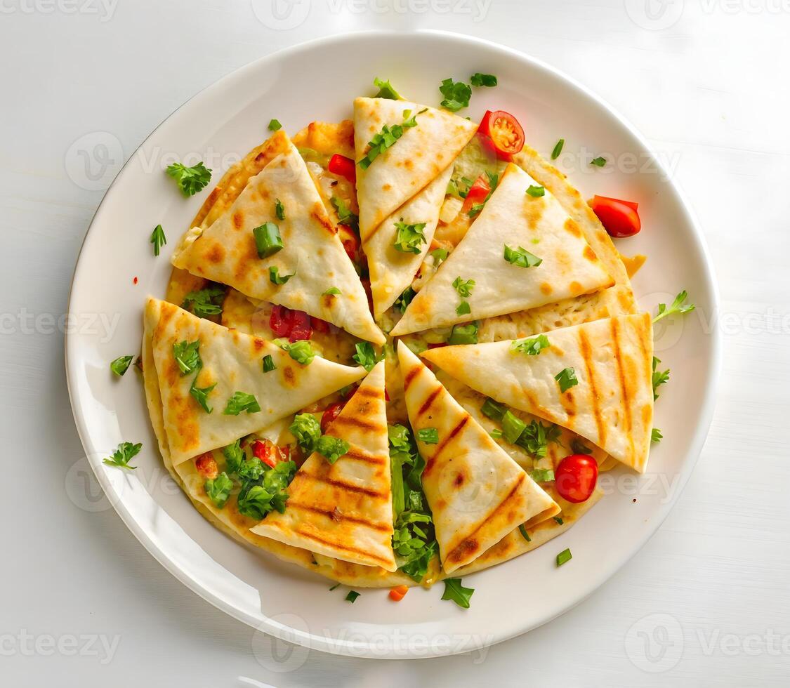 Top View of Chicken and Cheese Quesadillas on a Plate photo