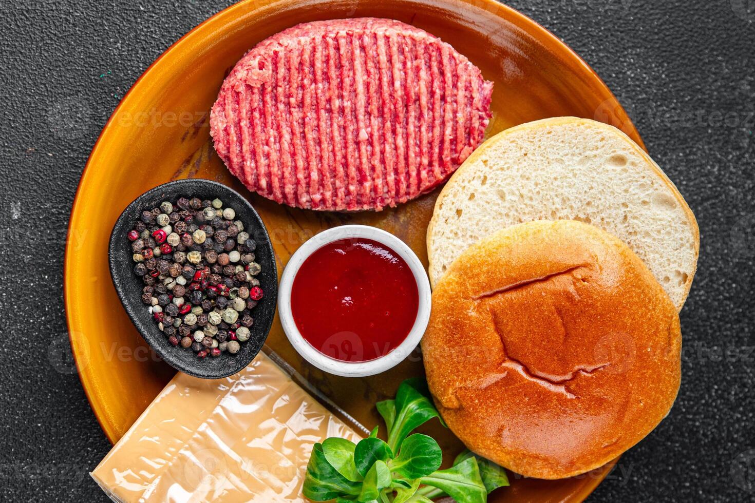 burger set raw cutlet, bun, cheese, tomato sauce, greens fresh cooking appetizer meal food snack on the table copy space food background rustic photo