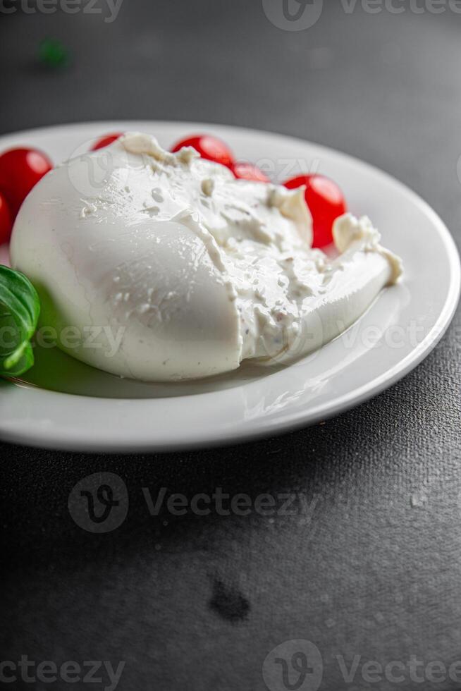 buffalo burrata Cooking appetizer meal food snack on the table copy space food background rustic top view keto or paleo diet vegetariano or paleo diet vegetarian photo