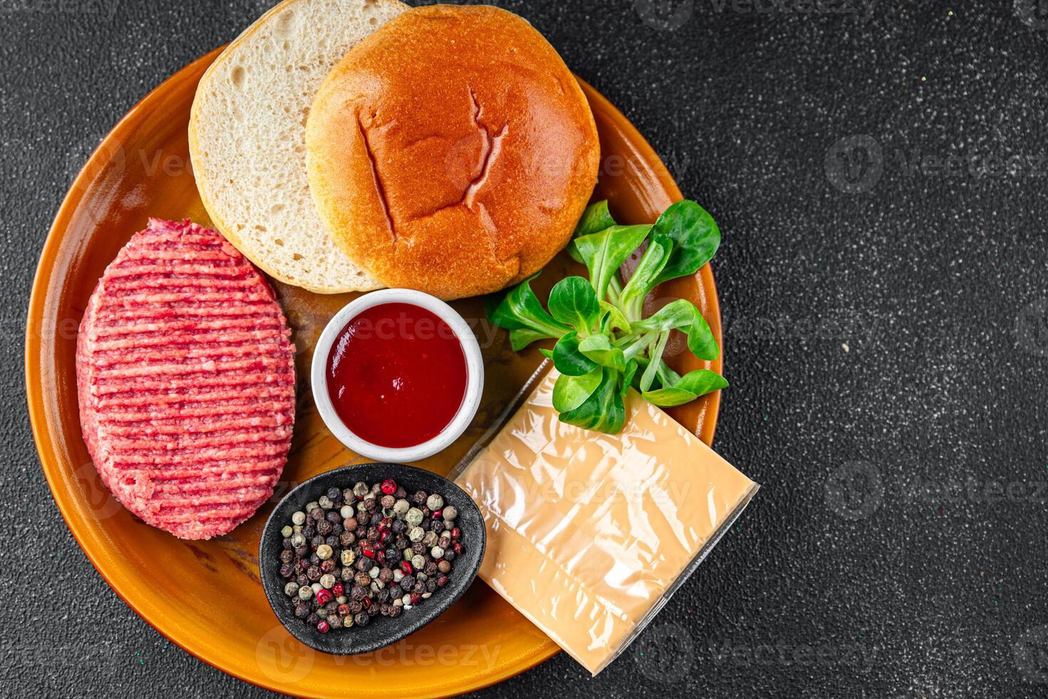 raw burger set cutlet, bun, cheese, tomato sauce, greens fresh cooking meal food snack on the table copy space food background photo