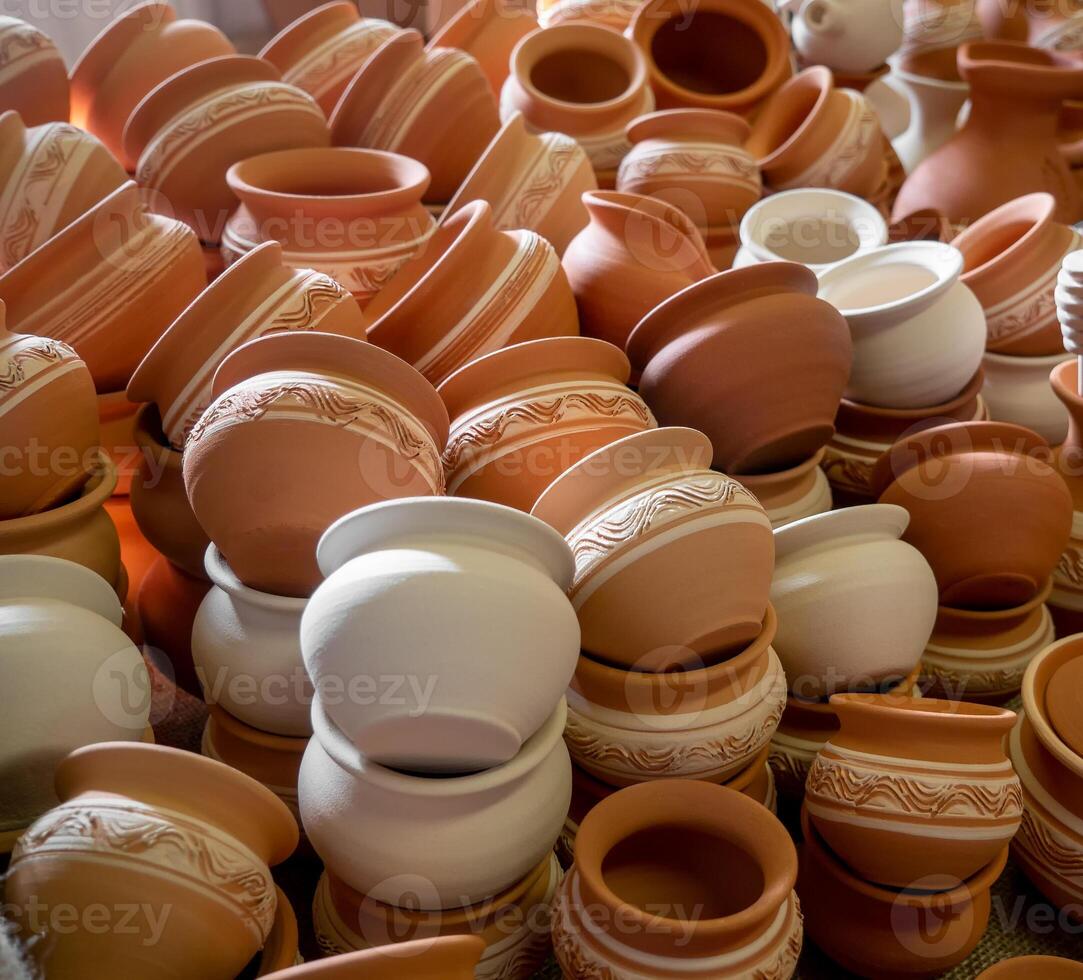 Clay jugs and pots, set of antique drinking utensils. pottery in the ceramics workshop. Pottery workshop, craft business photo