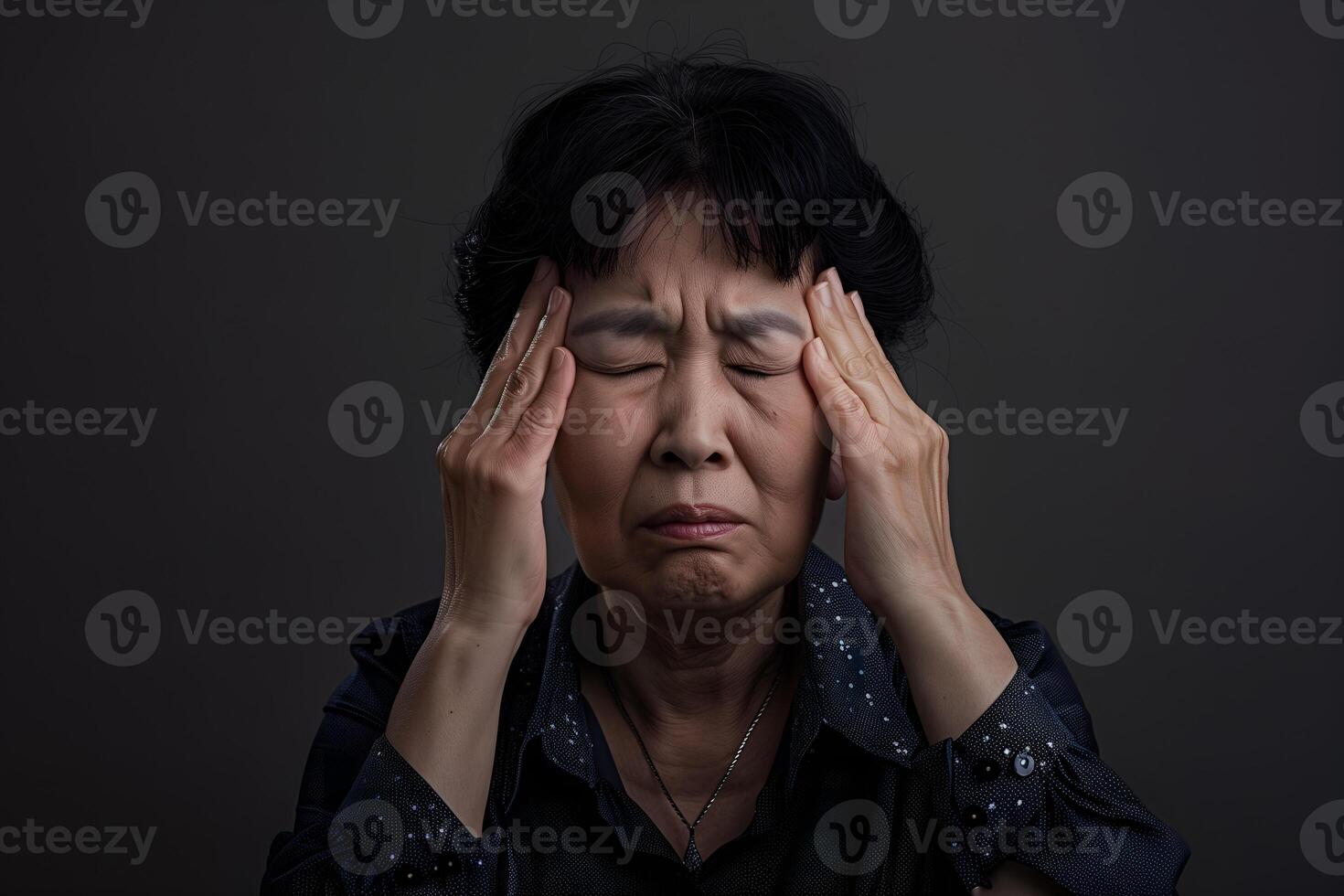 Asian elder woman suffering dizziness, vertigo, headache, fainting attack or stress. photo