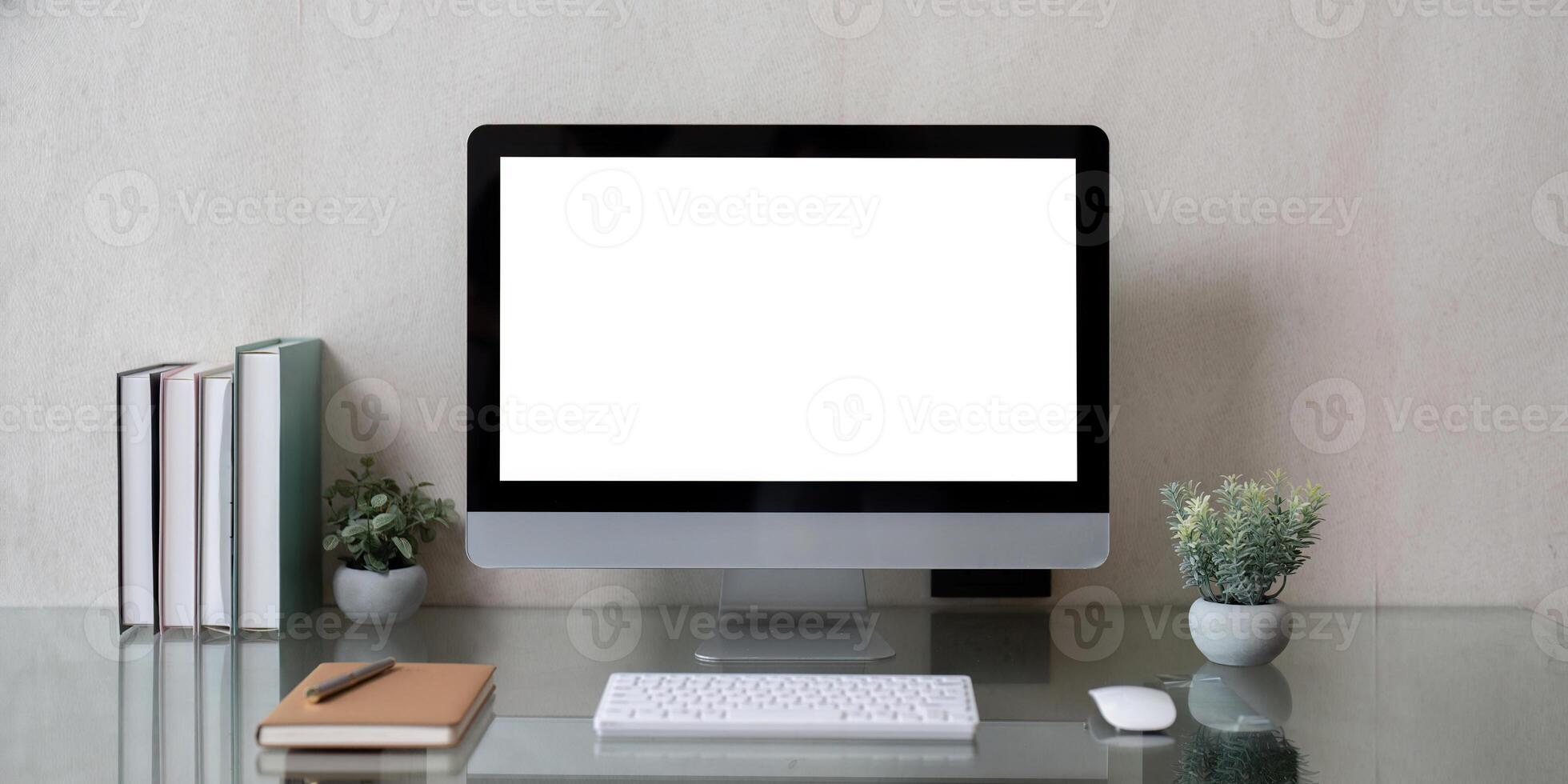 Workspace mock up desktop computer on table. copy space and blank screen photo