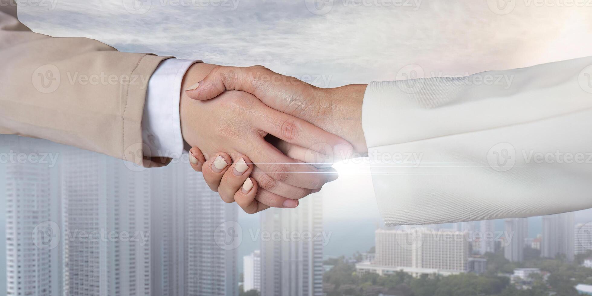 Business partnership meeting concept. Image businesspeople handshake. Successful businesspeople handshaking after business deal photo