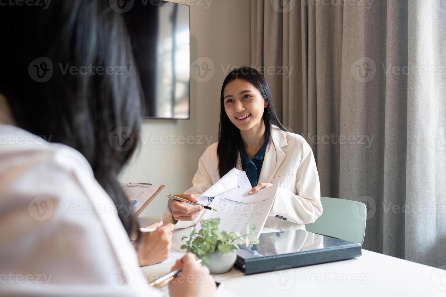 Business team meeting talking planning analyzing investment and marketing on tablet and laptop, discussing with financial data and business strategy, presentation to making profit of company photo