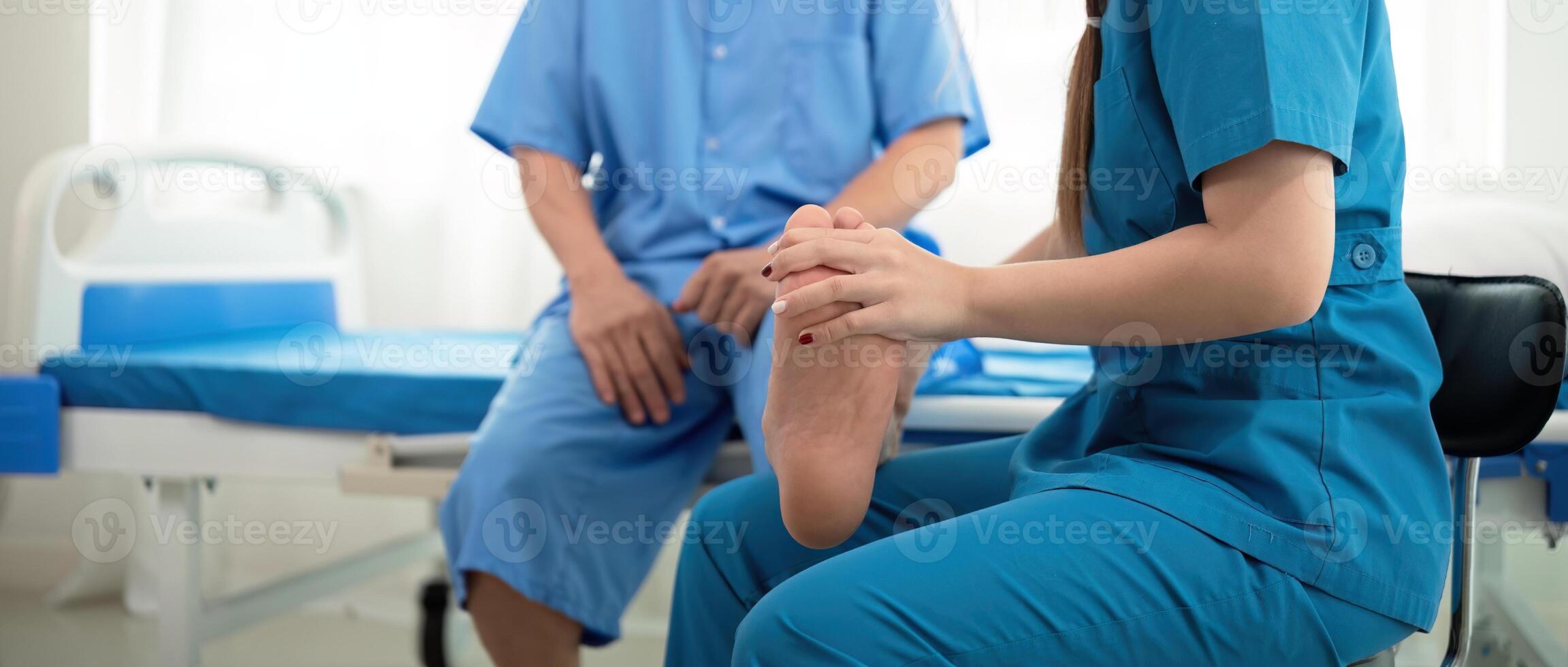Healthcare, physiotherapist and patient with foot injury, stretching and recovery with treatment, healing or care. physical therapy or consultation photo