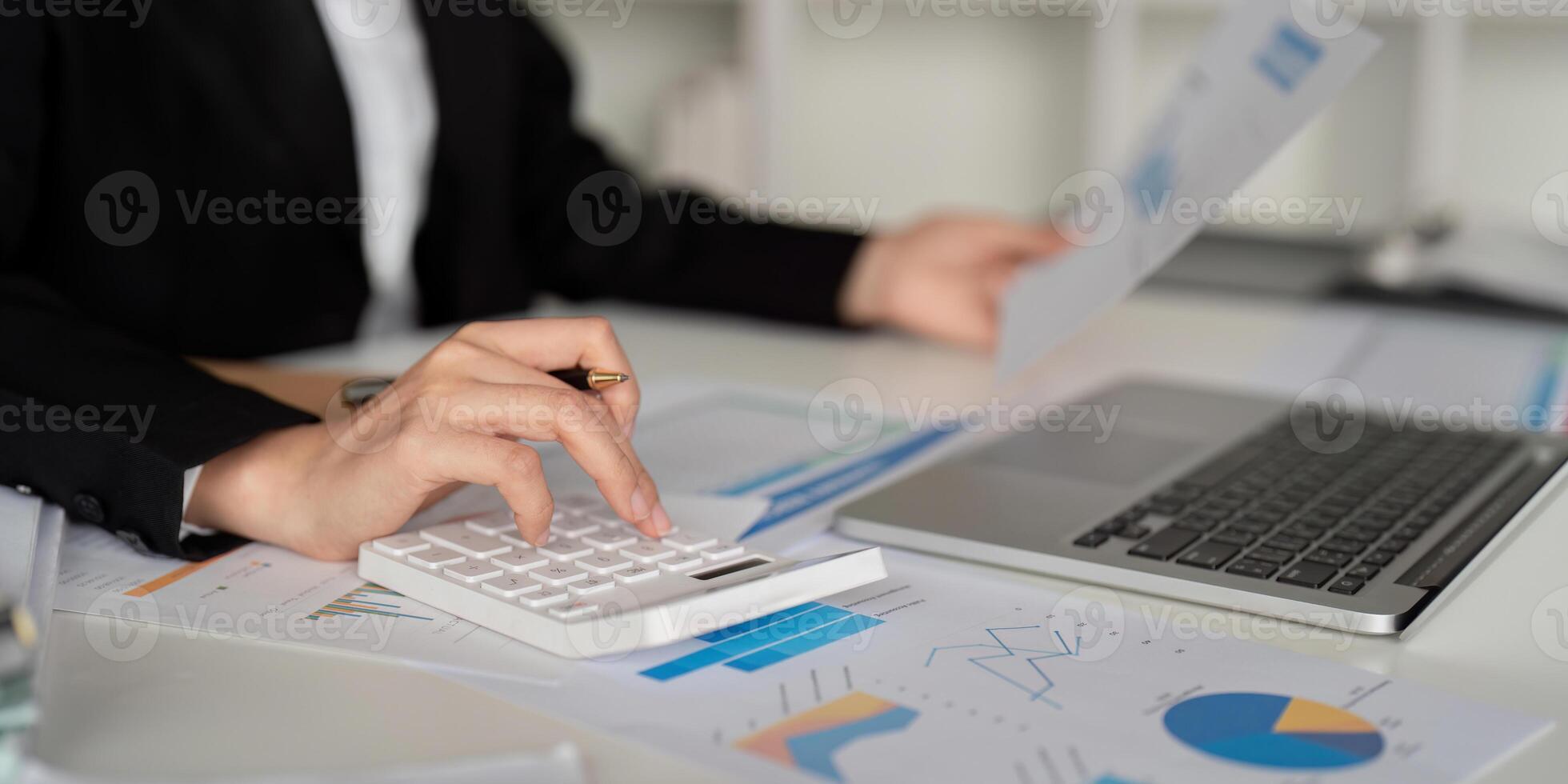Documents, Business woman and accountant reading report for information, financial data or analysis. Paperwork, auditor check, review and bookkeeping, Calculate finance and tax in office photo