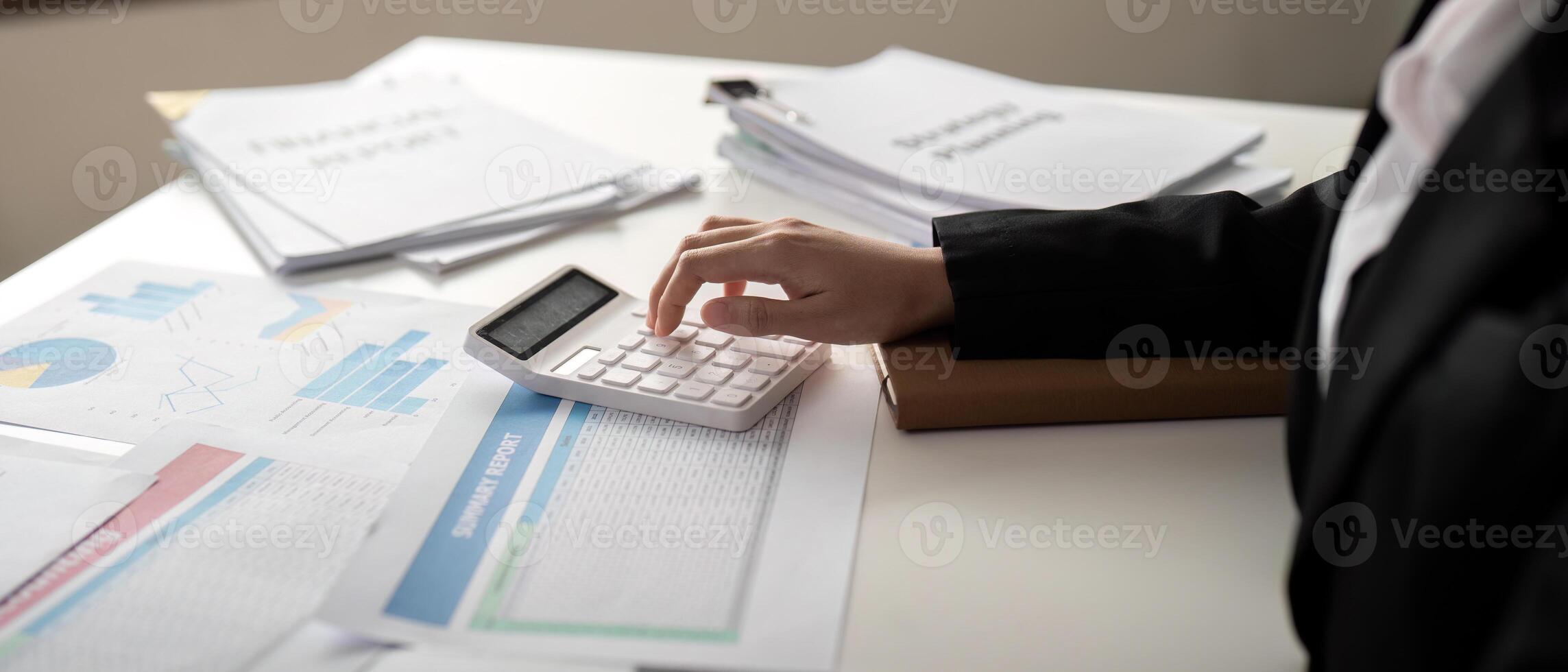 Documents, Business woman and accountant reading report for information, financial data or analysis. Paperwork, auditor check, review and bookkeeping, Calculate finance and tax in office photo