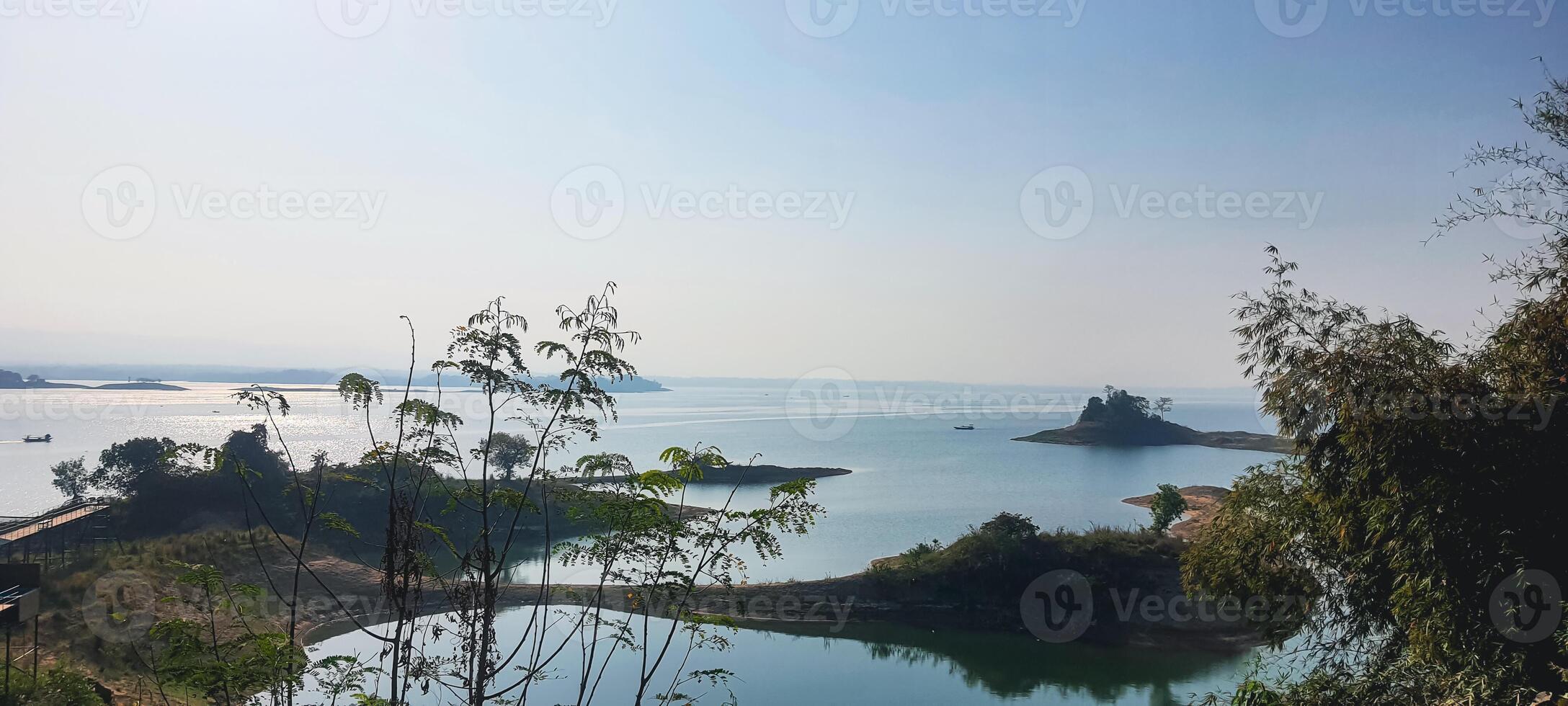 Foggy summer morning scenic view of Kaptai lake landscape photo