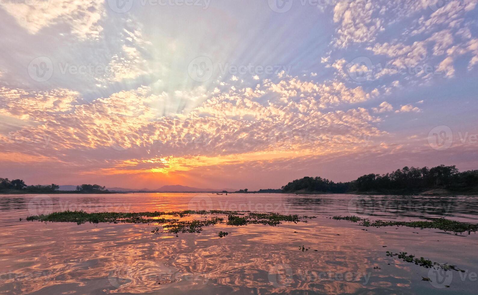 Idyllic colorful sunset cloudy sky of Kaptai Lake Rangamati Chittagong photo