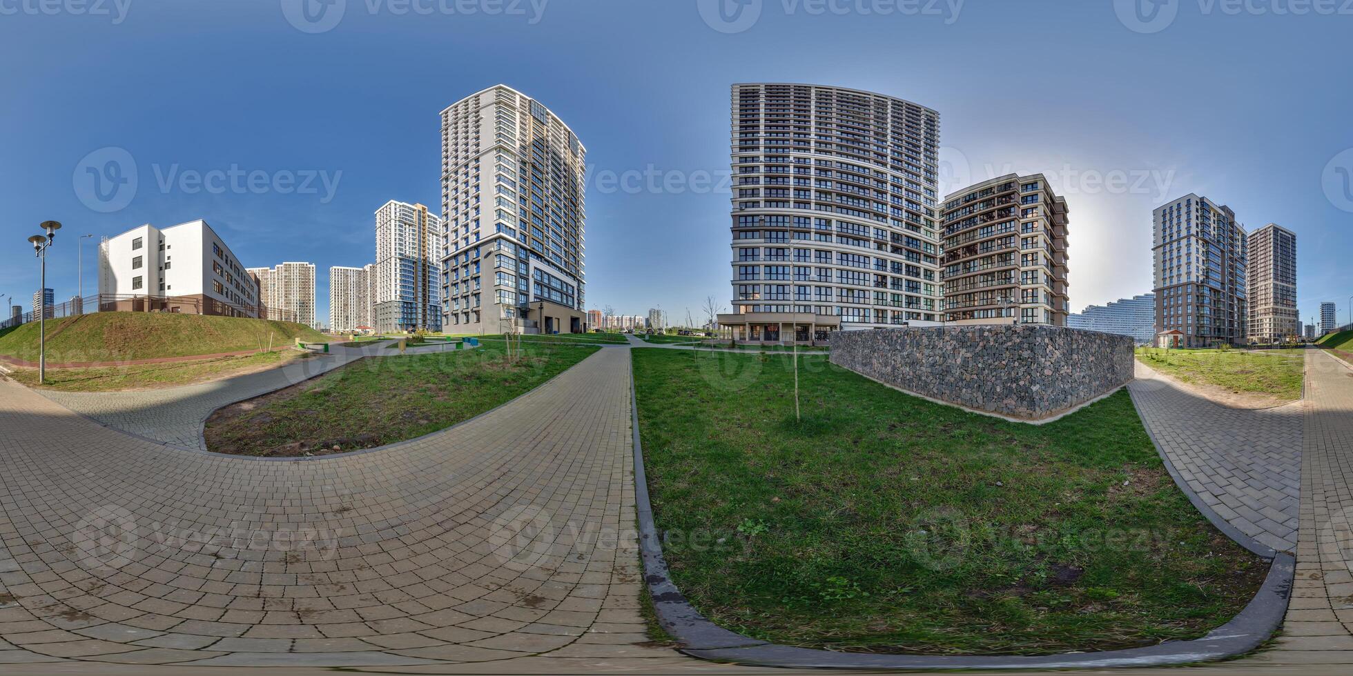 hdri panorama 360 near skyscraper multistory buildings of residential quarter complex in full equirectangular seamless spherical projection photo