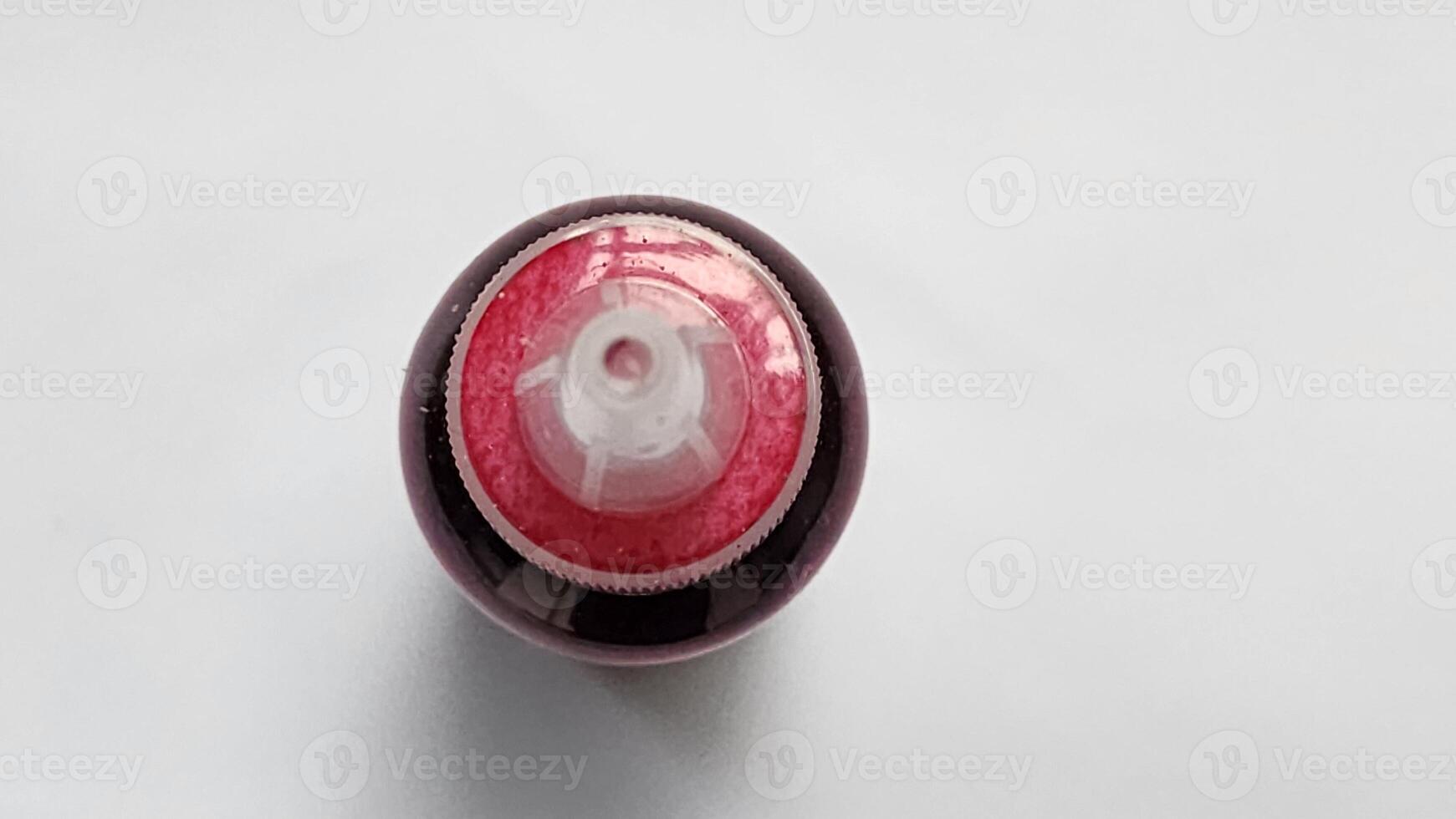 a close up of a red and white object photo