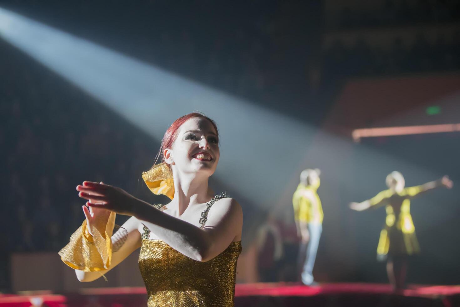 Belarus, the city of Gomel, April 07, 2019. Circus llusion of laughter.Performances of circus artists illuminated by a searchlight photo