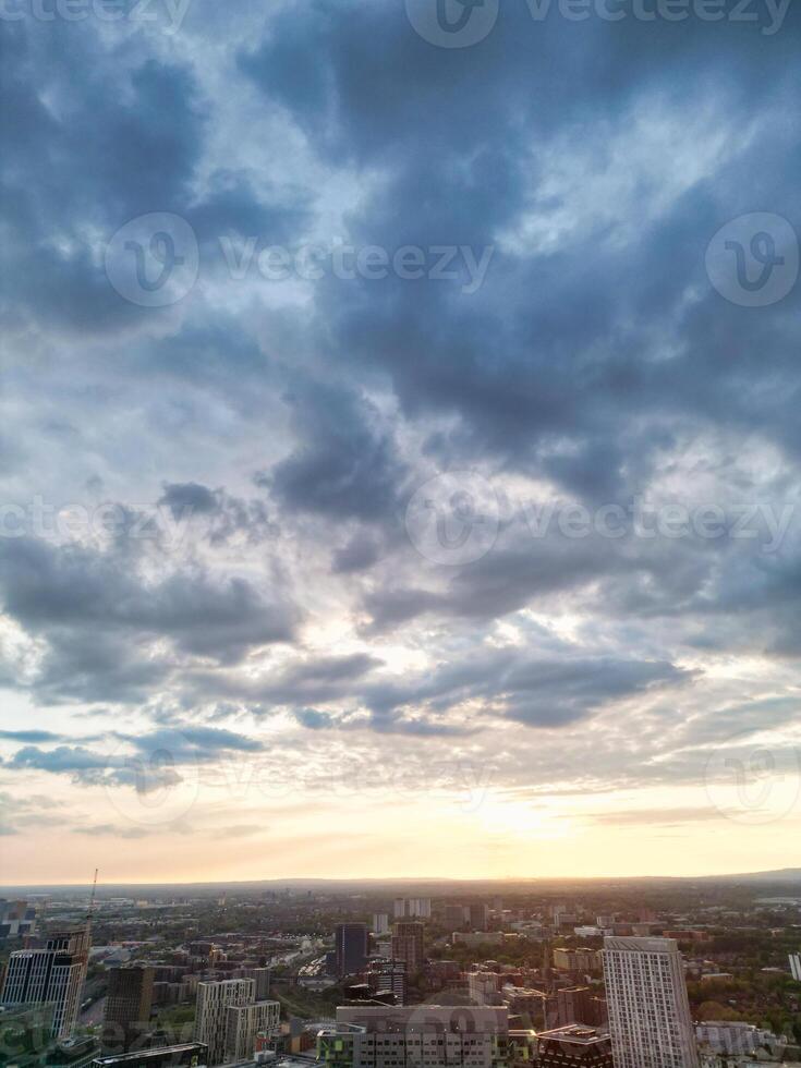 Aerial View of Greater Manchester City Centre and Tall Buildings During Golden Hour of Sunset. England UK. May 5th, 2024 photo