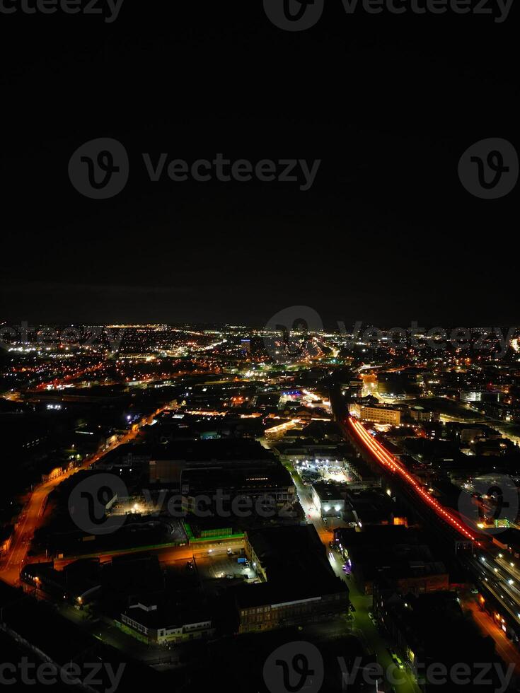 Aerial Night View of Illuminated City Centre Buildings of Birmingham Central City of England United Kingdom. March 30th, 2024 photo