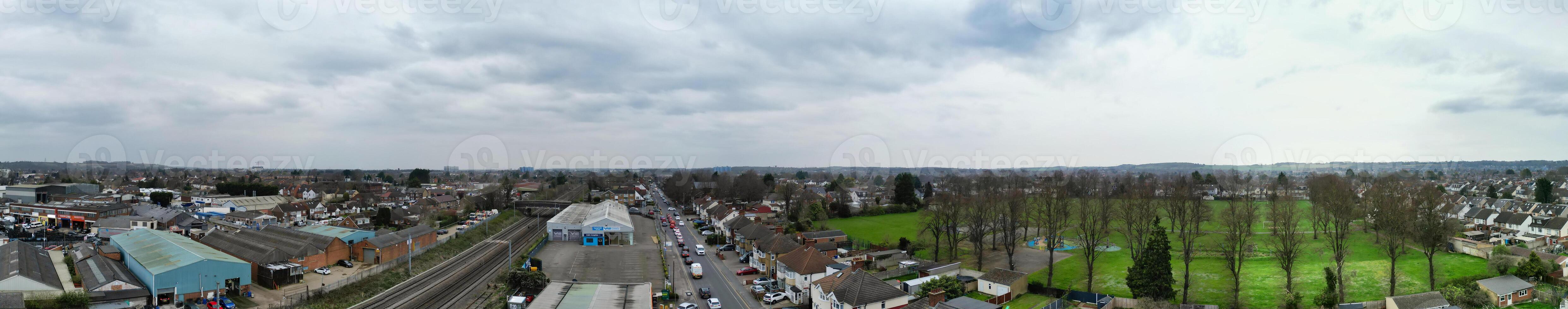 High Angle Panoramic View of Luton City during Cloudy and Rainy Sunset. Luton, England UK. March 26th, 2024 photo