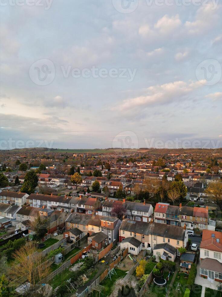 Most Beautiful Aerial View of Residential District During Orange Sunset over Luton, England UK. March 19th, 2024 photo