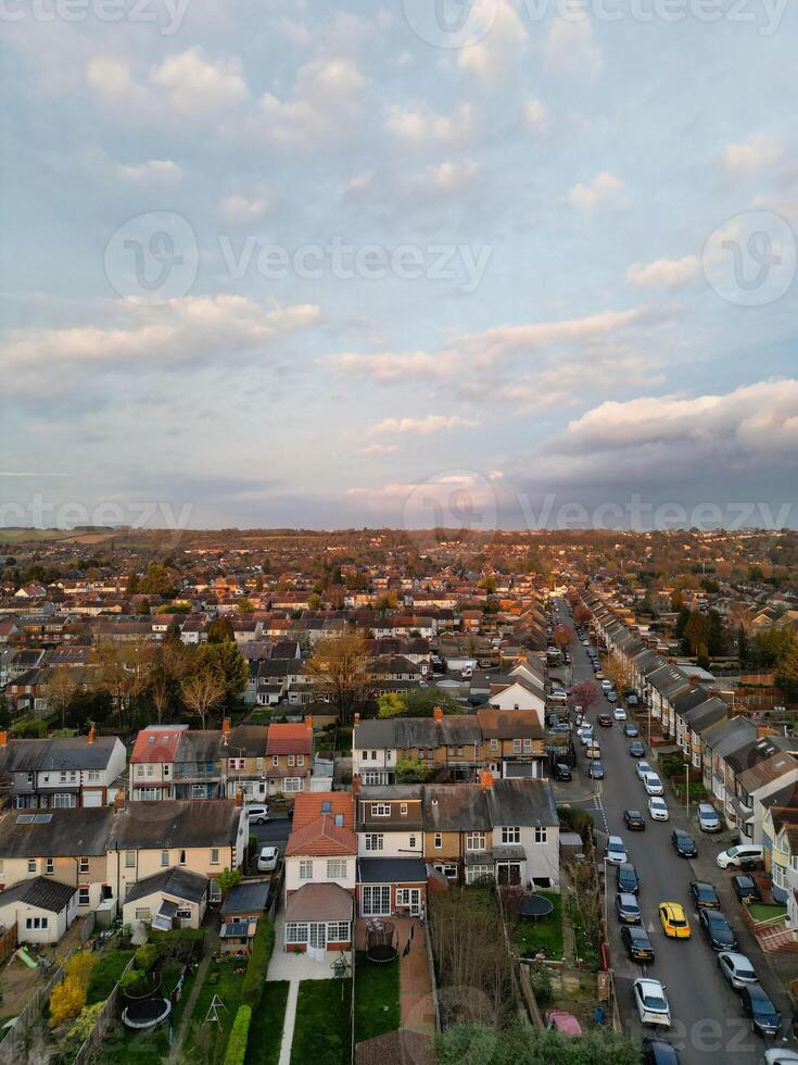 Most Beautiful Aerial View of Residential District During Orange Sunset over Luton, England UK. March 19th, 2024 photo