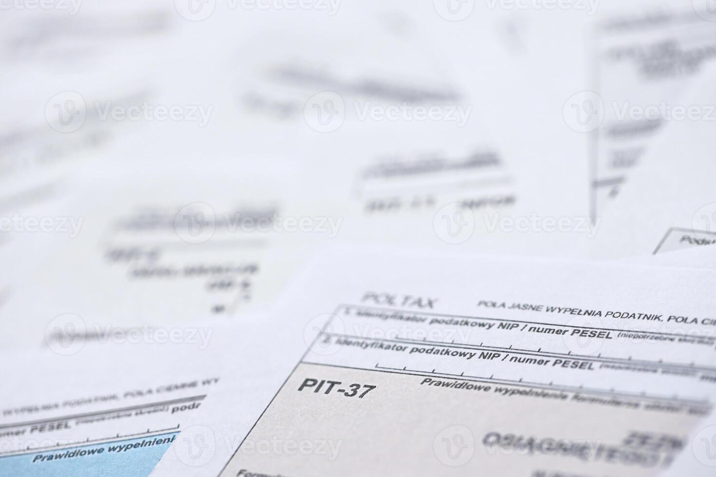 Very big amount of polish tax form blanks with PIT, CIT and VAT categories. Accounting, bureaucracy and taxpayers routine in Poland photo