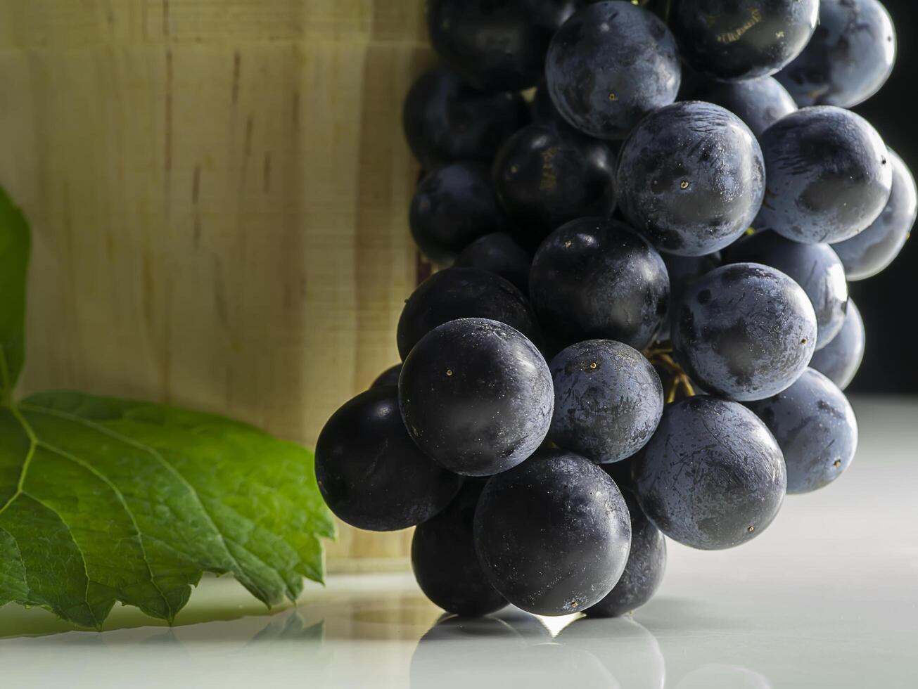 Close up Black grape with light and space. photo