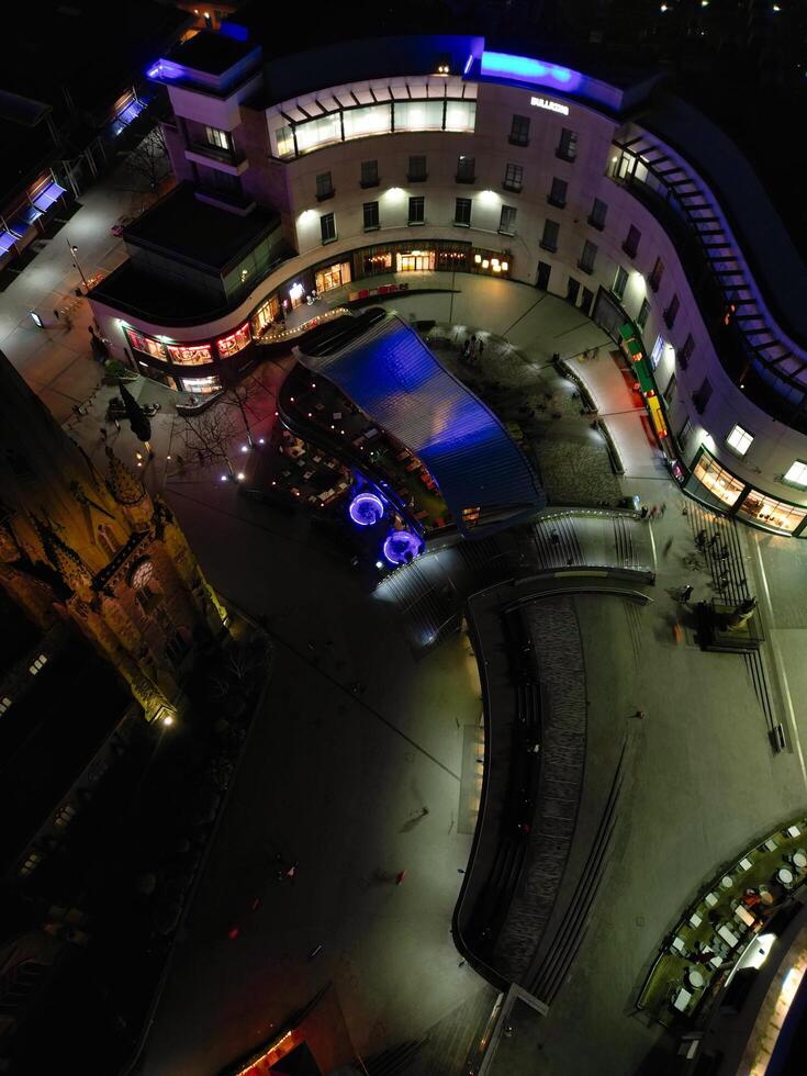 aéreo noche ver de iluminado ciudad centrar edificios de Birmingham central ciudad de Inglaterra unido Reino. marzo 30, 2024 foto