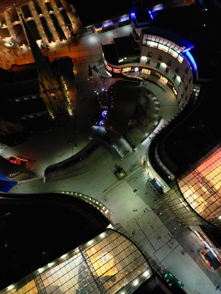 Aerial Night View of Illuminated City Centre Buildings of Birmingham Central City of England United Kingdom. March 30th, 2024 photo